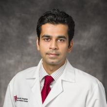 Headshot of Dr. Sidhartha Tavri, MD in doctor's white coat