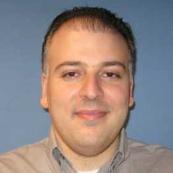 Headshot of Dr. Christos Kosmas