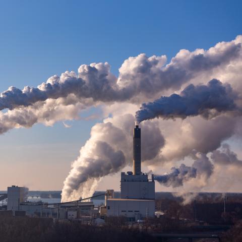 Pollution and smoke emitted from factory smoke stacks