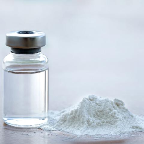 drug vial next to powder