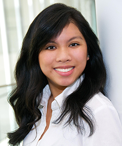 Headshot of Elisse Cortez, posed and smiling for the camera