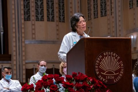 Mildred Lam addressing the medical students