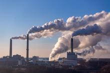 Pollution and smoke emitted from factory smoke stacks