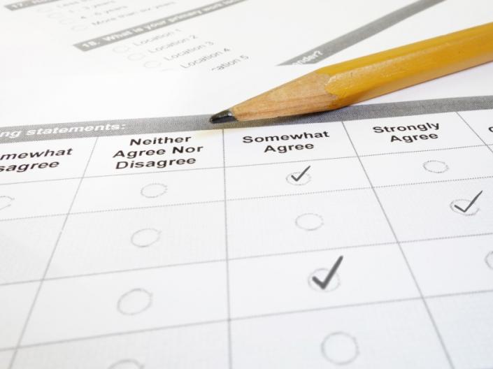 An evaluation chart with a handful of boxes selected by a pencil