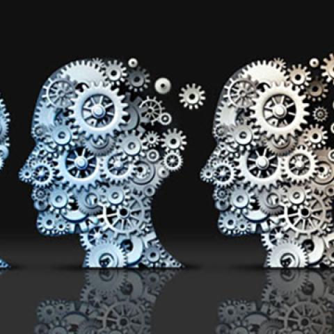 abstract graphic with three human heads representing cognitive loss