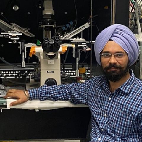 Gaaminepreeet Singh in front of equipment