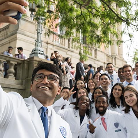 CWRU first year medical students taking a selfie after white coat ceremony