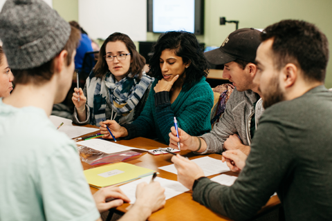 CWRU medical students in small group discussing their case study