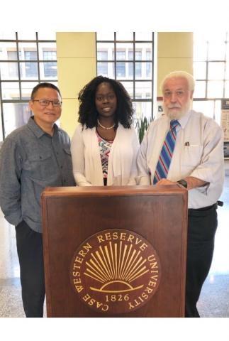 image of Li Li, MD, PhD (left), Monica Webb Hooper, PhD, and Nathan A. Berger, MD (right)
