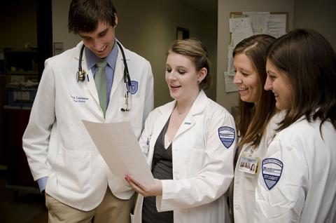 CWRU university students working at the free clinic