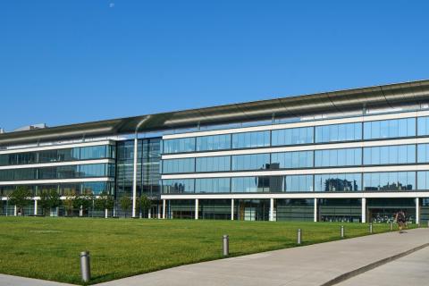 An external shot of the Health Education Campus on a bright summer day.