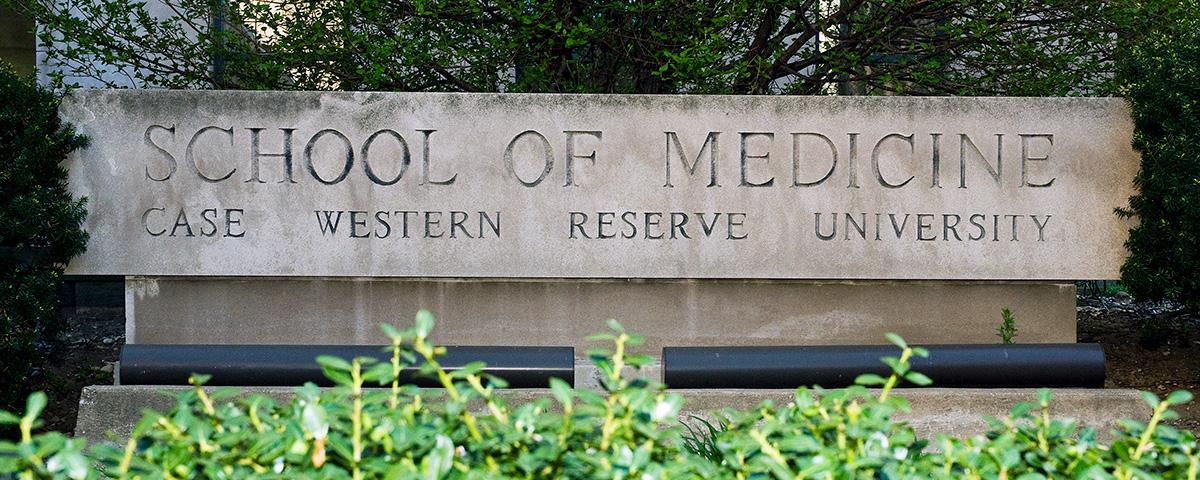 Engraved stone sign of the Case Western Reserve School of Medicine outside