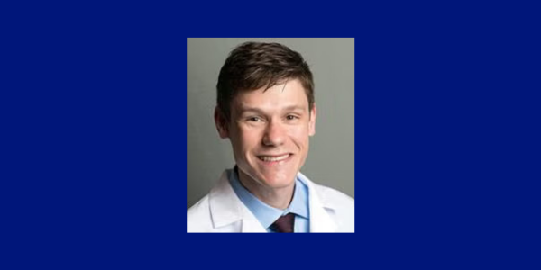 Headshot of Andrew Golden, MD on a CWRU Blue background.