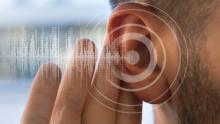 stock image of hand next to ear and graphic interpretation of sound waves over top