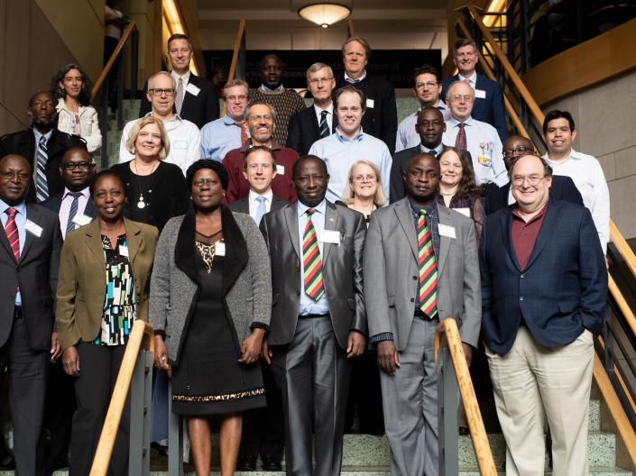 Large group of people standing on staircase for group photo