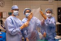 Doctors in their uniforms working