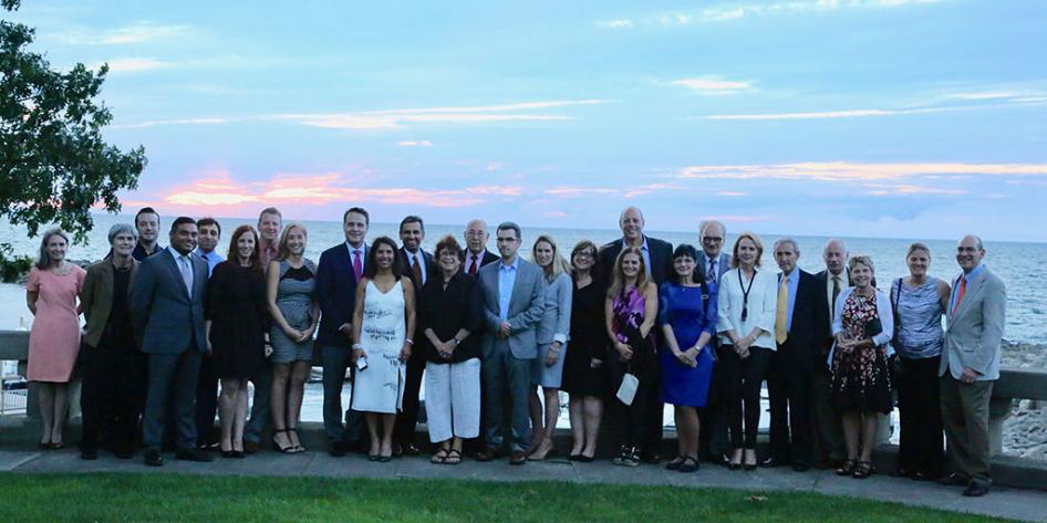 5th Annual Dr. Jerry Goldstone Endowed Lectureship Group 2017 Photo with 26 persons with Lake Erie sunset backdrop