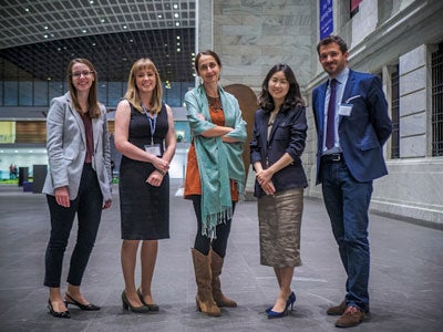 Photo of Becca Woodruff, Reed O’Mara, Elina Gertsman, Eunyoung Park, and Vincent Debiais posing for a photo in the Cleveland Museum of Art