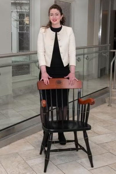 Allison Kraus standing with her chair