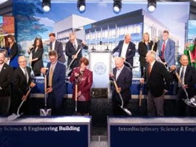 Photo from the ISEB groundbreaking, featuring dignitaries with their shovels