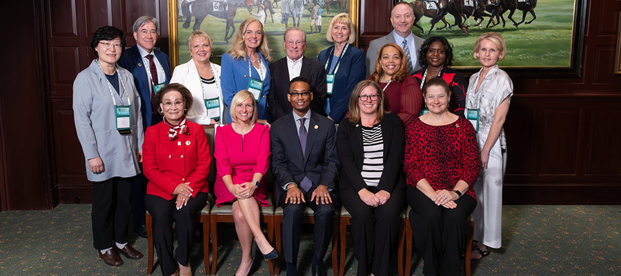 Frances Payne Bolton School of Nursing community member inductees into the AAA 2025 Class of Fellows pose as a group.
