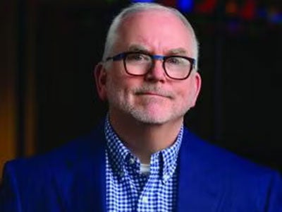 Rex Tibbons headshot