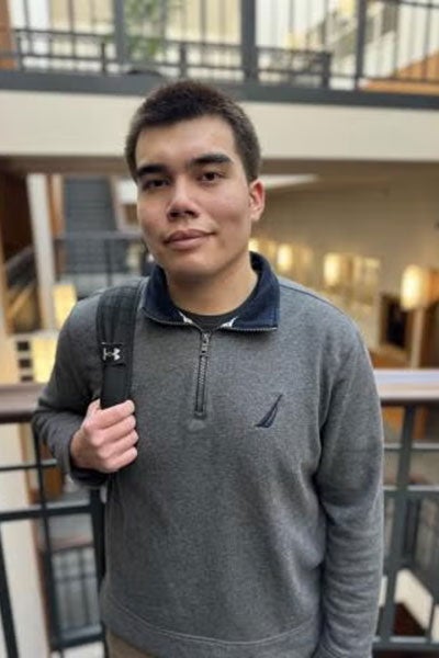 Brian Ibanez pictured in the Adelbert Hall atrium