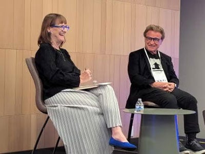 Karen Kaler and Norman Aladjem on stage at the Los Angeles event