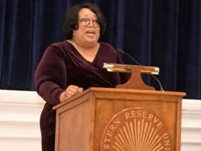 Linda Sharpe-Taylor speaks at a CWRU podium