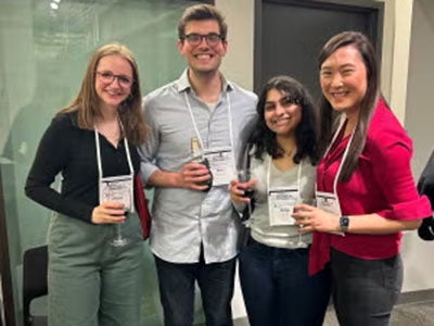 Alumni pose for a photo as part of the New York City Destination Weekend