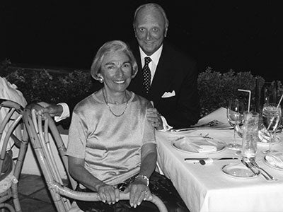 Milton and Roslyn Wolf pictured at dinner in a black and white photo