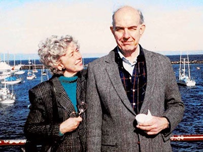 Ann and Dr. James Swinehart standing in front of the water