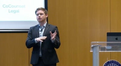 Oliver Roberts delivering lecture on AI ethics and the law