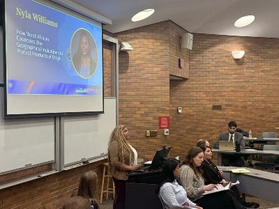 Nyla Williams presenting to a classroom