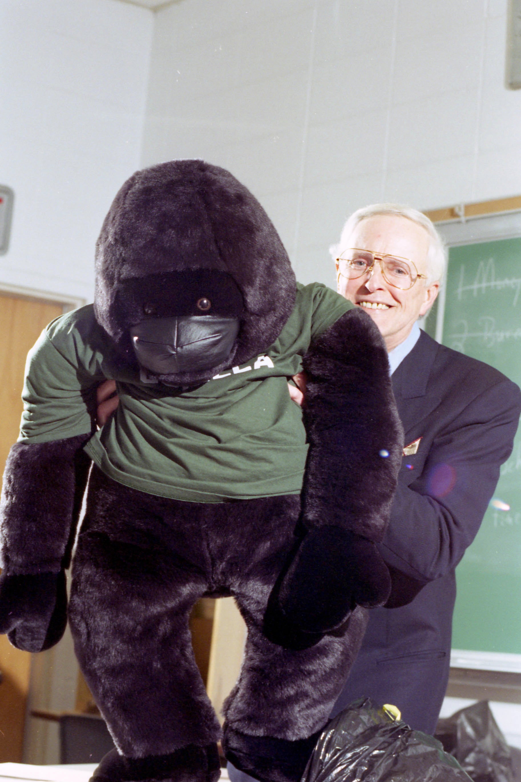 Richard Osborne holding stuffed gorilla