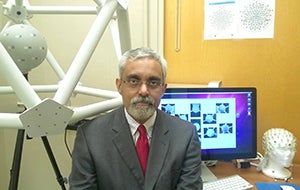 Alberto Costa working in a lab