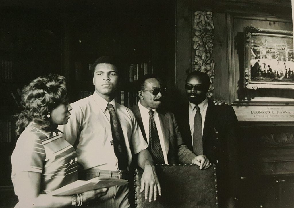 Black and white photo of Muhammad Ali in the Hanna Lounge at Karamu House