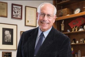 headshot of Arnold Caplan