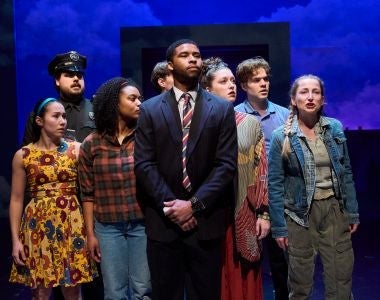 CWRU MFA students perform on stage in a production. 