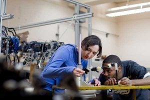 CWRU students working in a robotics lab