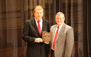 Gary Ciepluch accepts his "Outstanding Music Educator" award