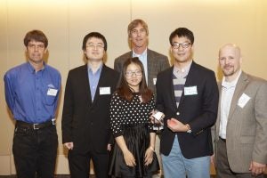 First place team and judges from left: Dave Stresing (Saint-Gobain), Tao Liu (MS Mechanical Engineering), Doug Heneghan (Saint-Gobain), Wenjun Zou (MSM, Finance), Bowen Wang (MS, Systems and Control Engineering) and Michael Francis (Saint-Gobain). Not pictured: Liang Yue (PhD, Materials Science and Engineering)  Photo by Kevin Kopanski Photography
