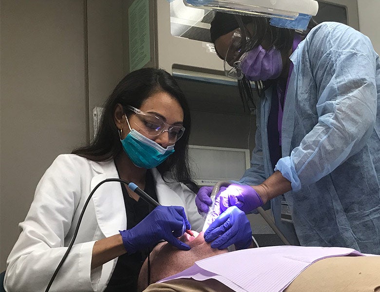 dentist works on a patient