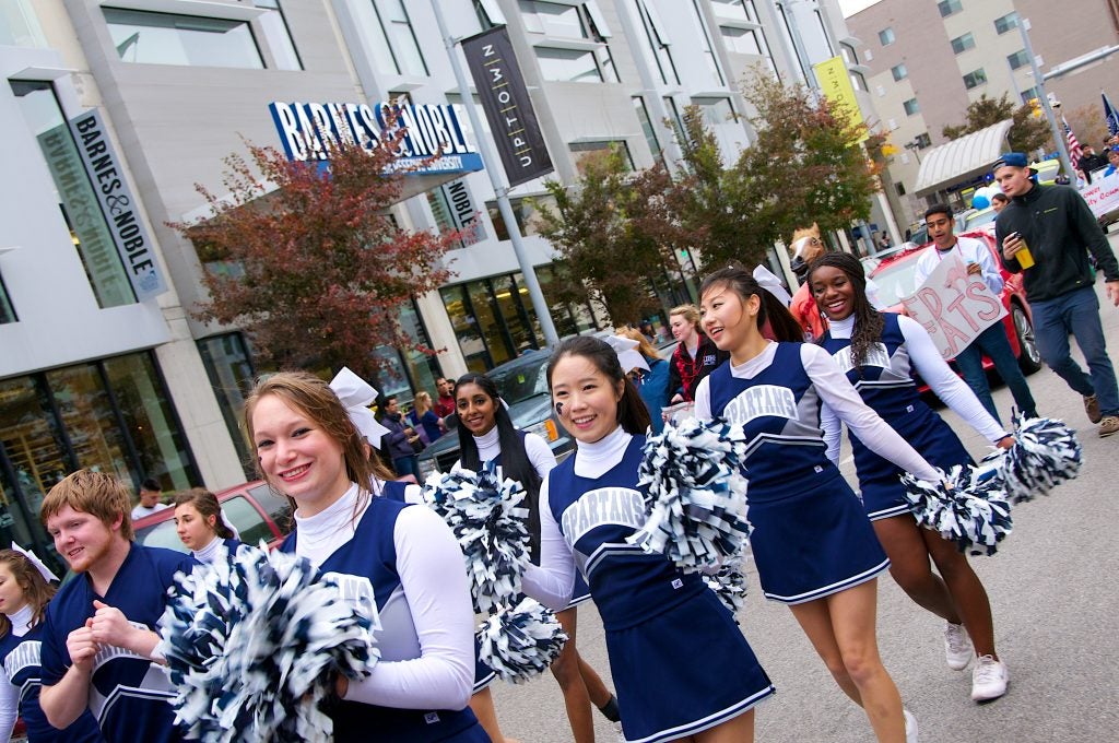 Cheerleaders participate in homecoming festivities