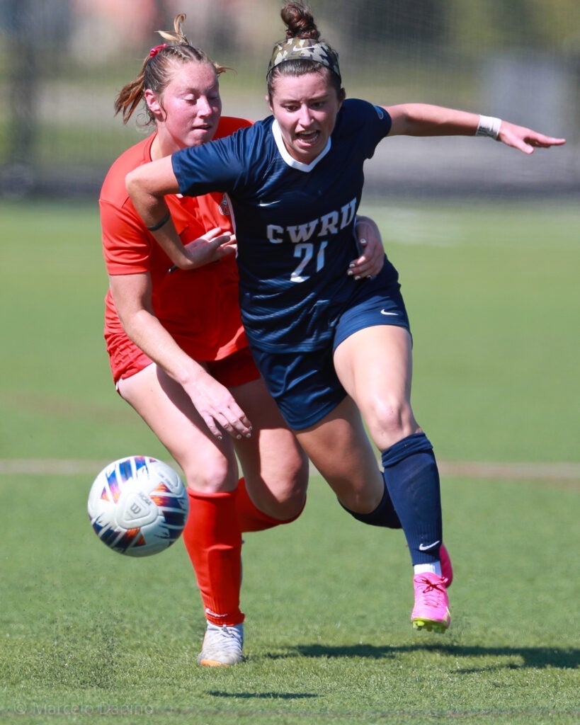 Action shot of Sydney Schenk chasing a ball during a soccer game.