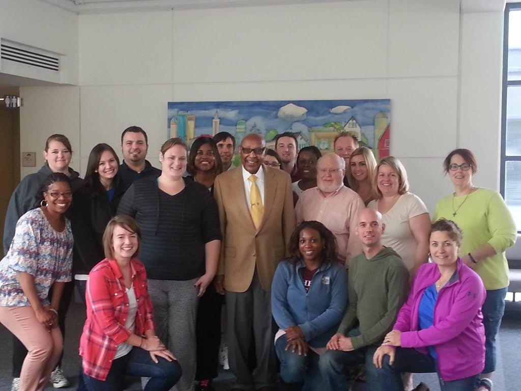Social work students took a photo with Congressman Stokes after he taught class last fall.