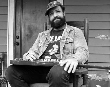 Black and white photo of Lee Bains captured by Joe Steinhardt
