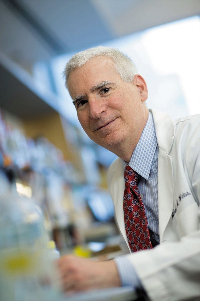 Photo of Michael Weiss in his lab at CWRU