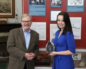Catherine Osborn with Jim Edmonson as she accepts the Student Employee of the Year Award