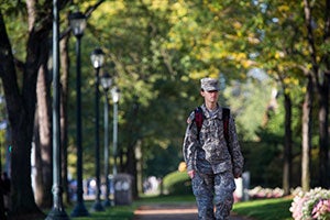 ROTC cadet walking across CWRU campus